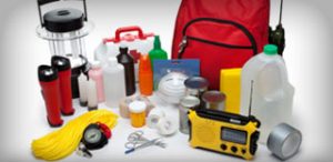 Emergency supplies arranged on a white background.